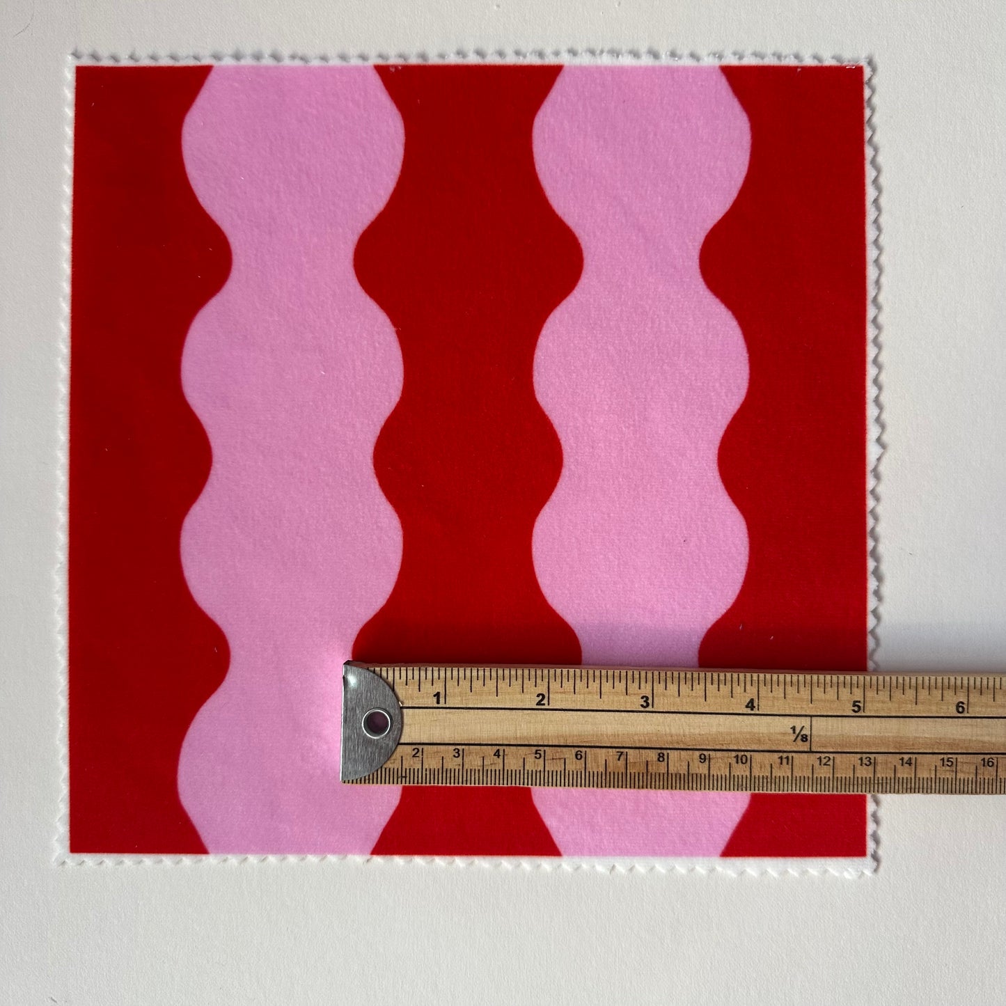 ‘Wiggle With Me’ wavy fabric in red and pink colours