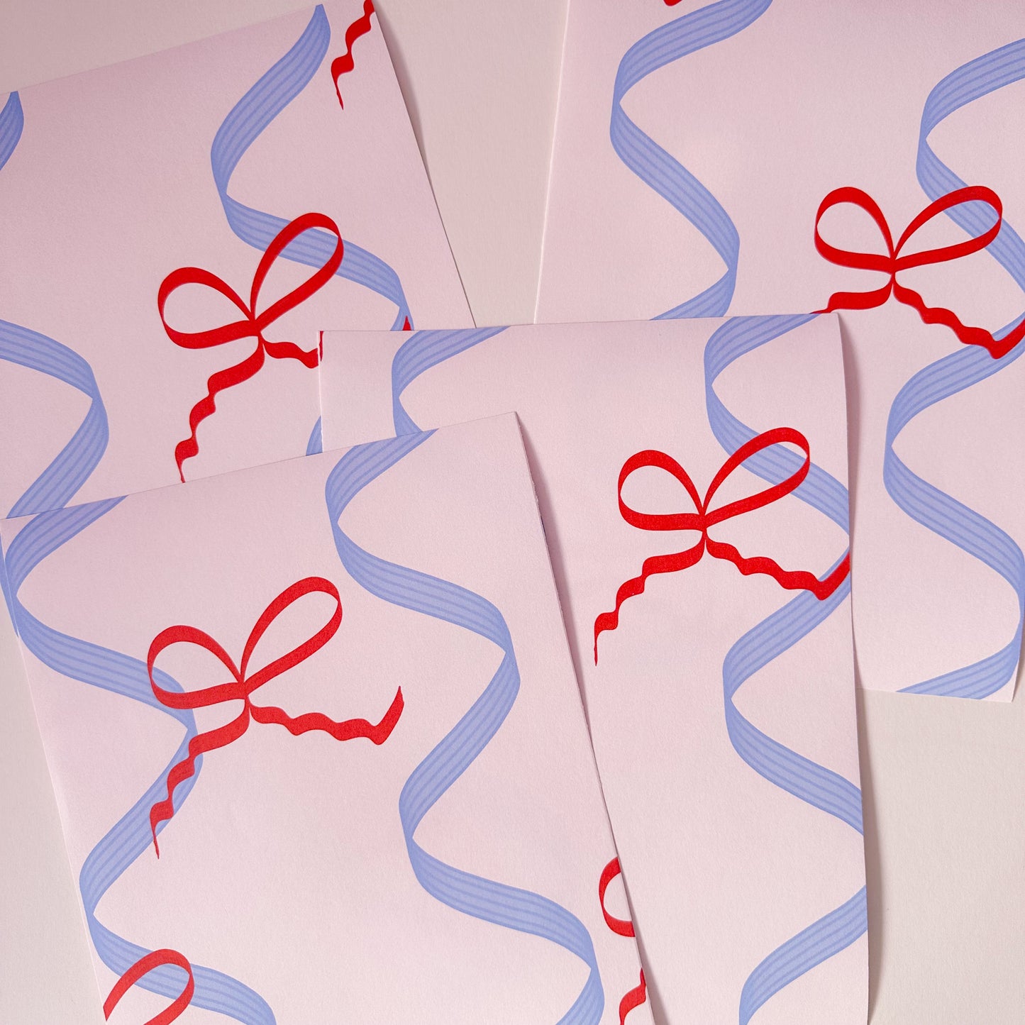 'Mad about the Bows' Wallpaper in blue, red and pink | Ribbons and Bows wallpaper in blue, red and pink