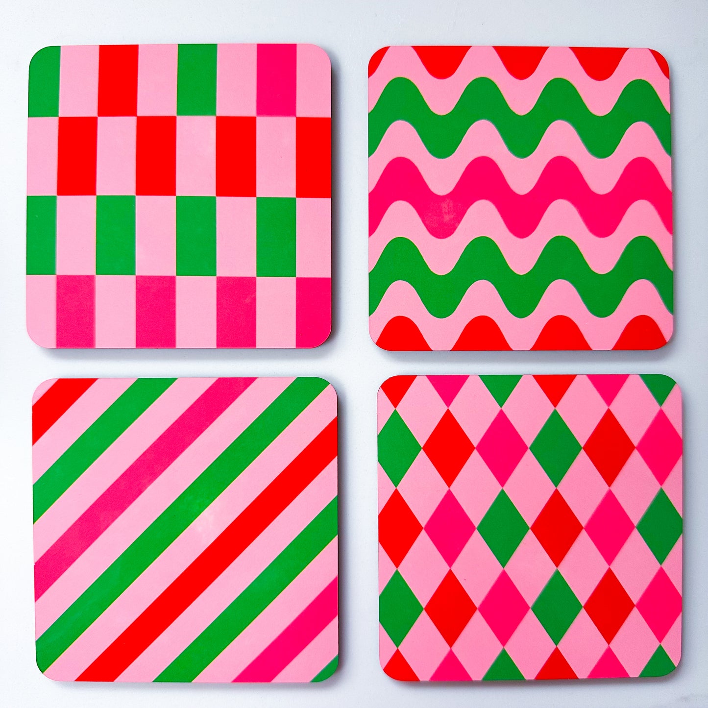 ‘Abstract mix’ Christmas coasters in pink, red and green