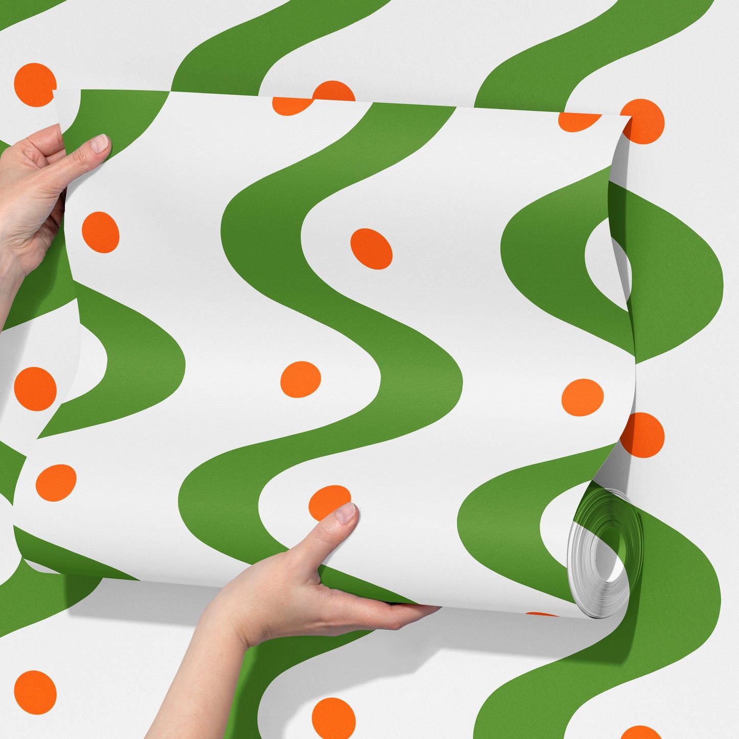 ‘A Wave of Dots’ Wallpaper in Grass Green and Tangerine | Wallpaper with wavy and polka dot pattern