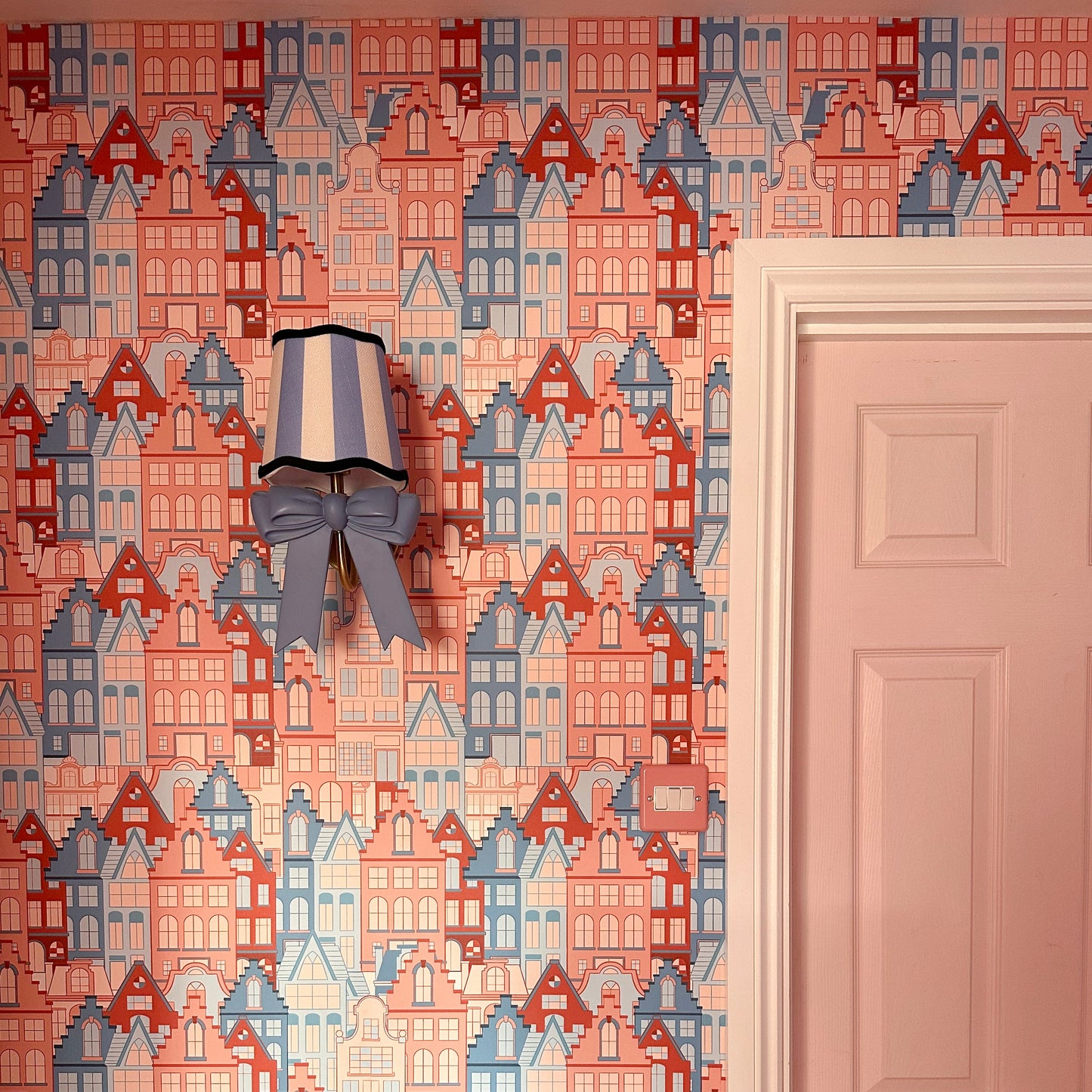 ‘House Party' vintage inspired wallpaper in terracotta and blue