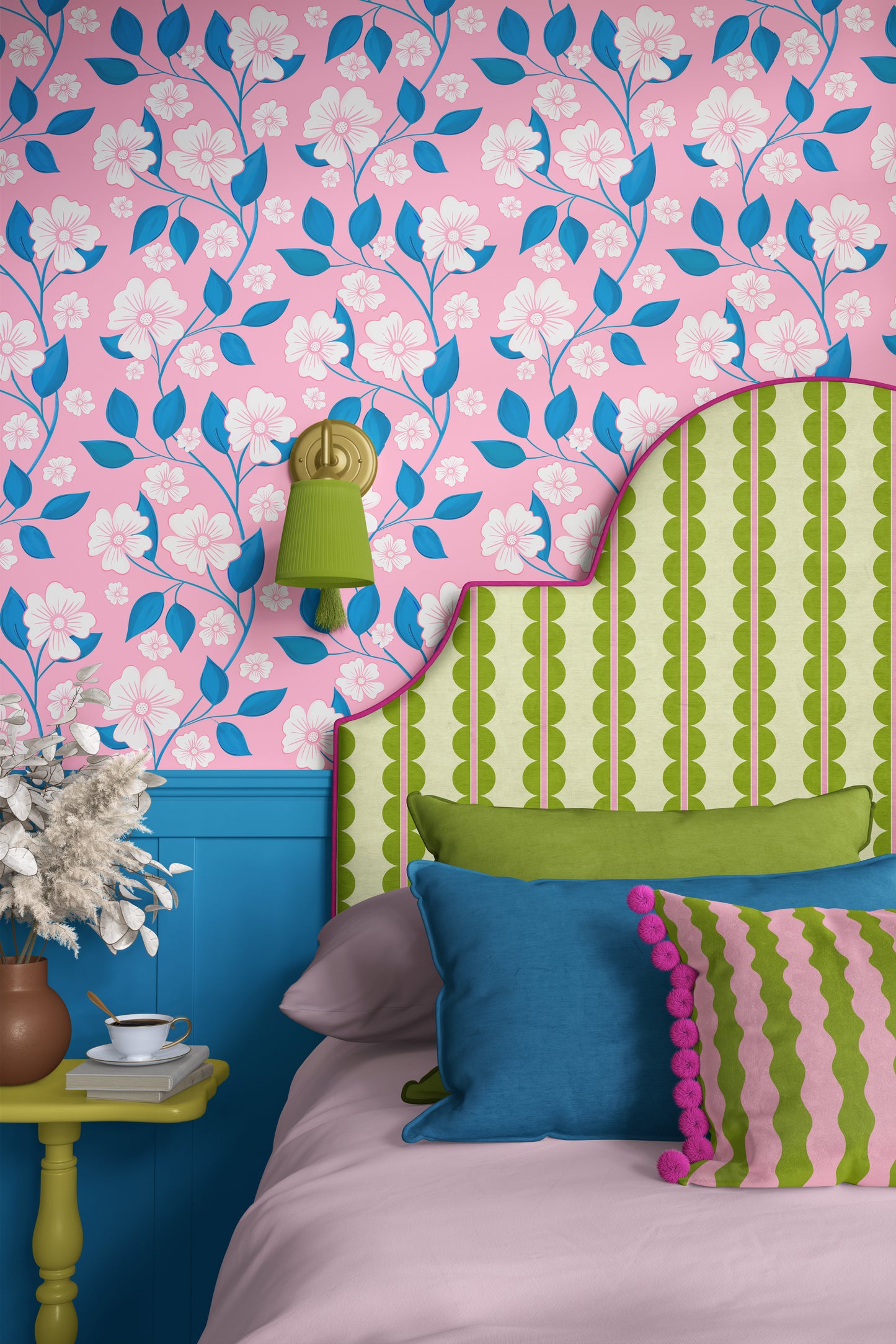 Floral wallpaper in pink and turquoise, green and pink headboard with scallop design