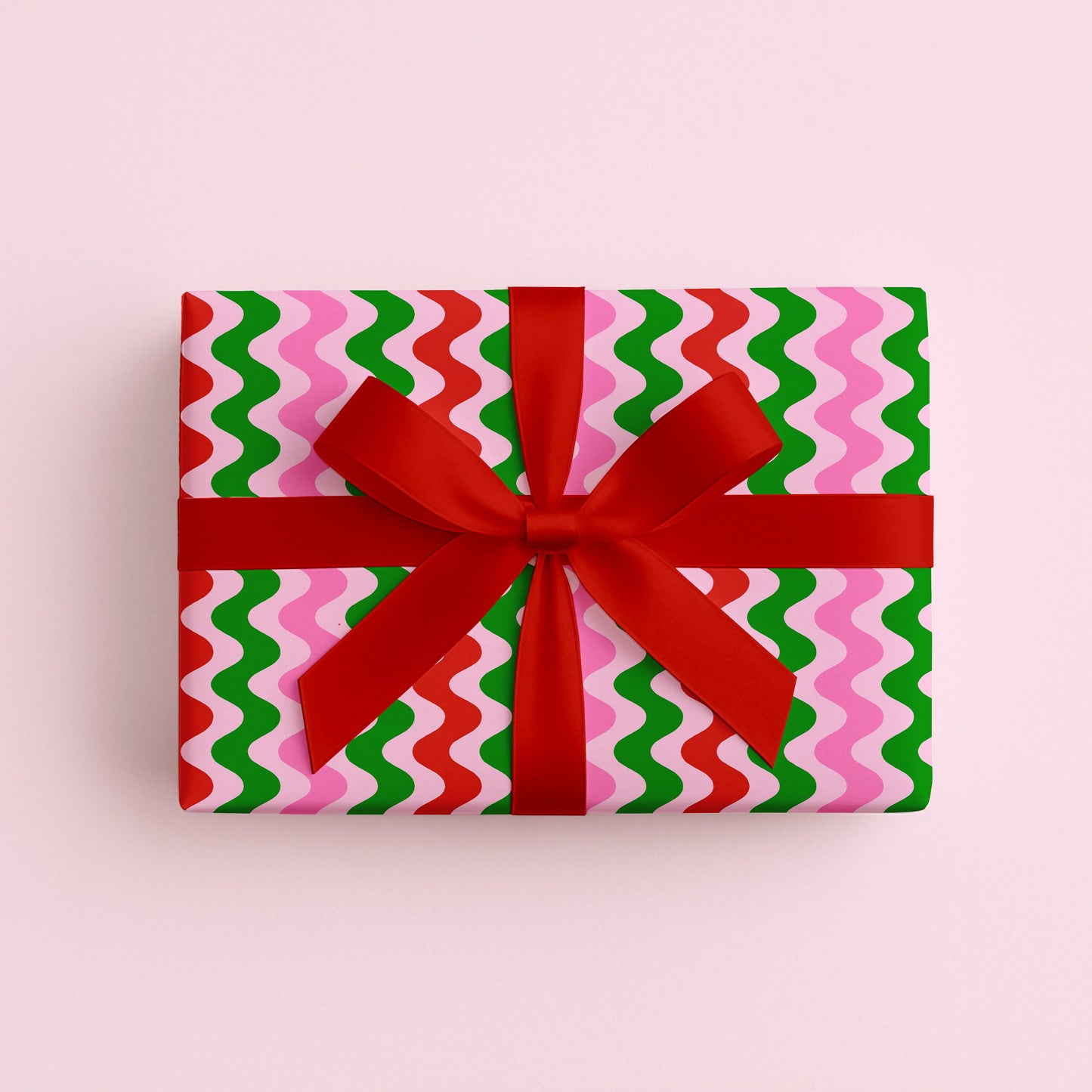 wavy christmas gift wrap, modern gift packaging, pink and red gift wrap, pastel gift packaging