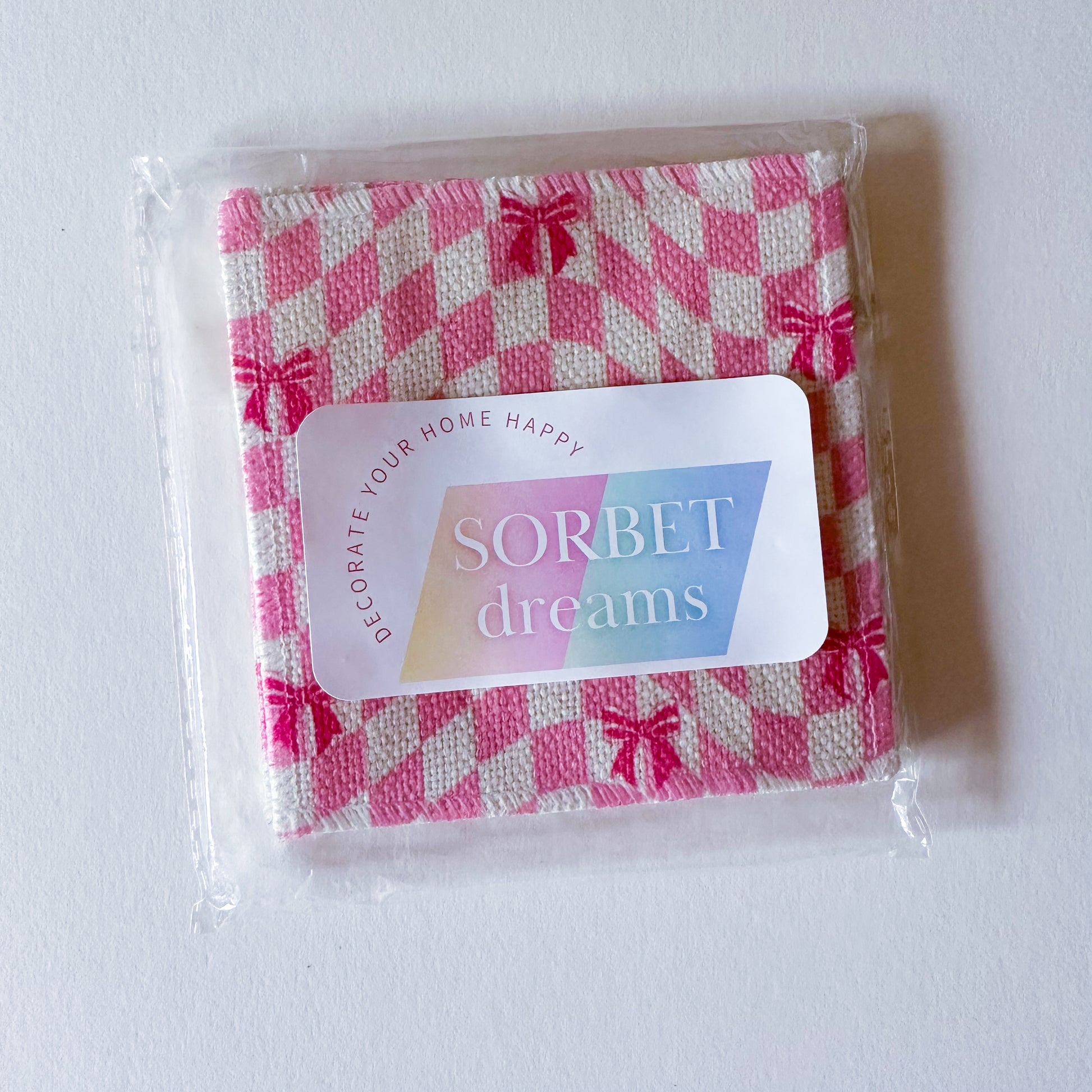 pink drink coasters with ribbons and checks pattern