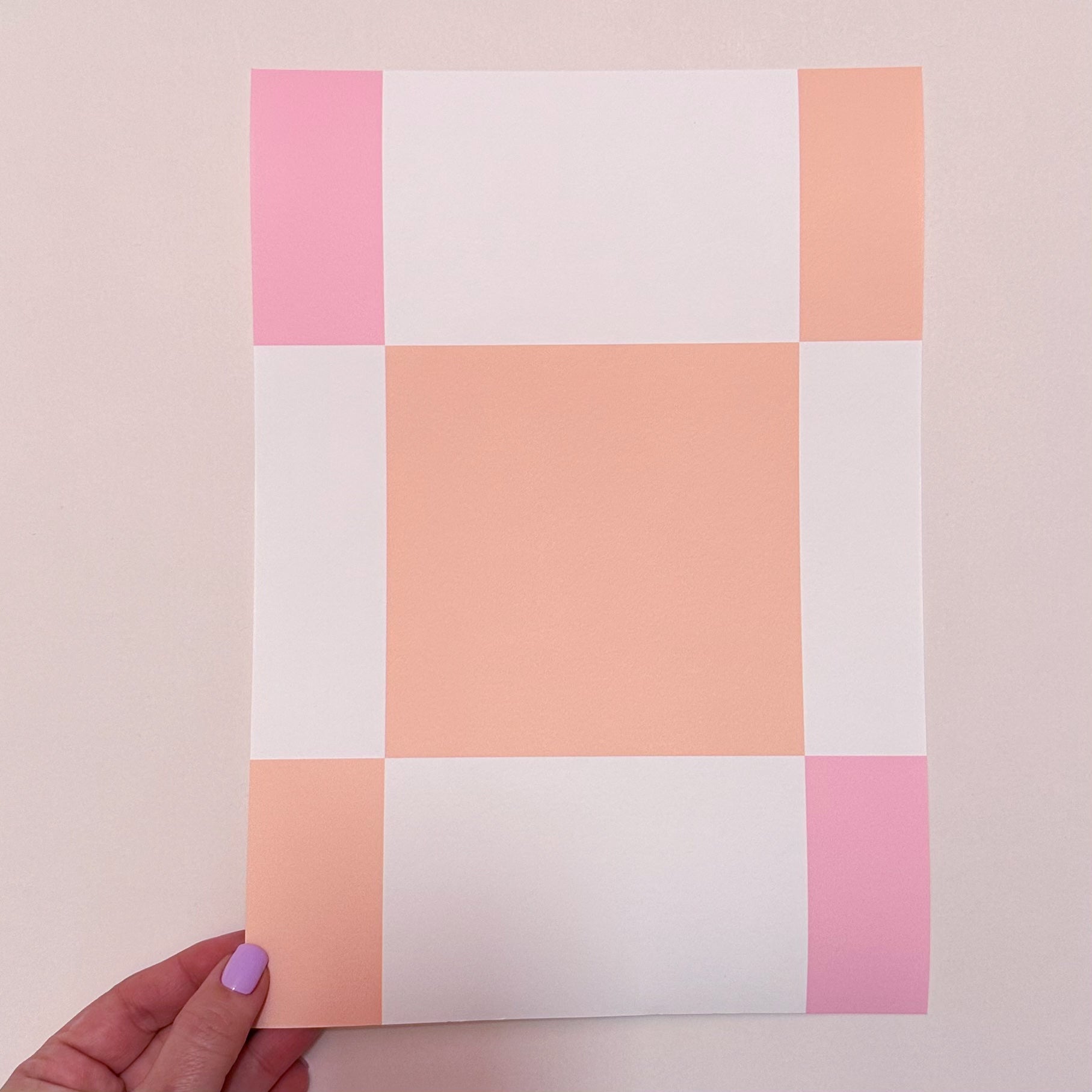 Peach and pink colour interior wallpaper with checkerboard design 