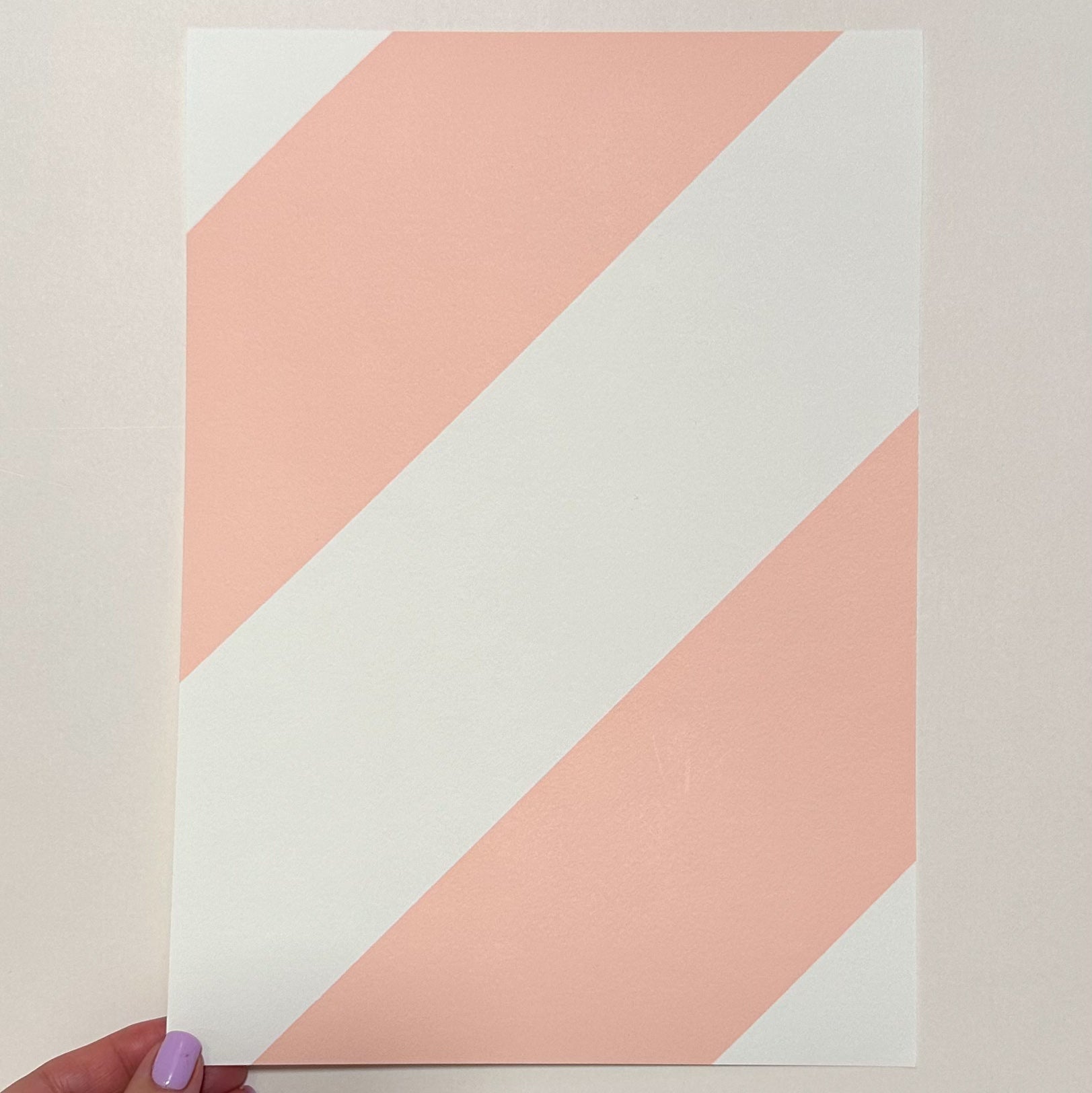 Peach interior wallpaper with diagonal stripes 