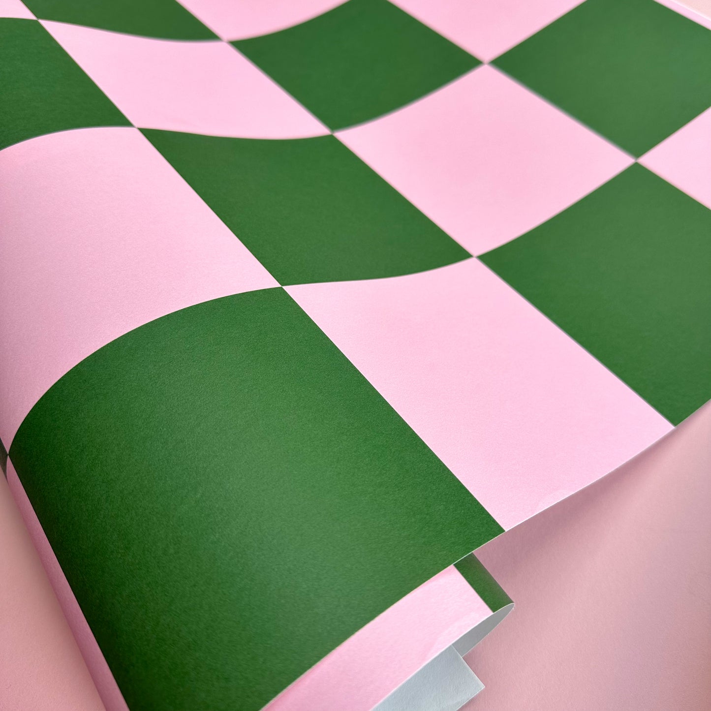 ‘Checkmate’ Checkerboard Wallpaper in Forest Green and Pink colours