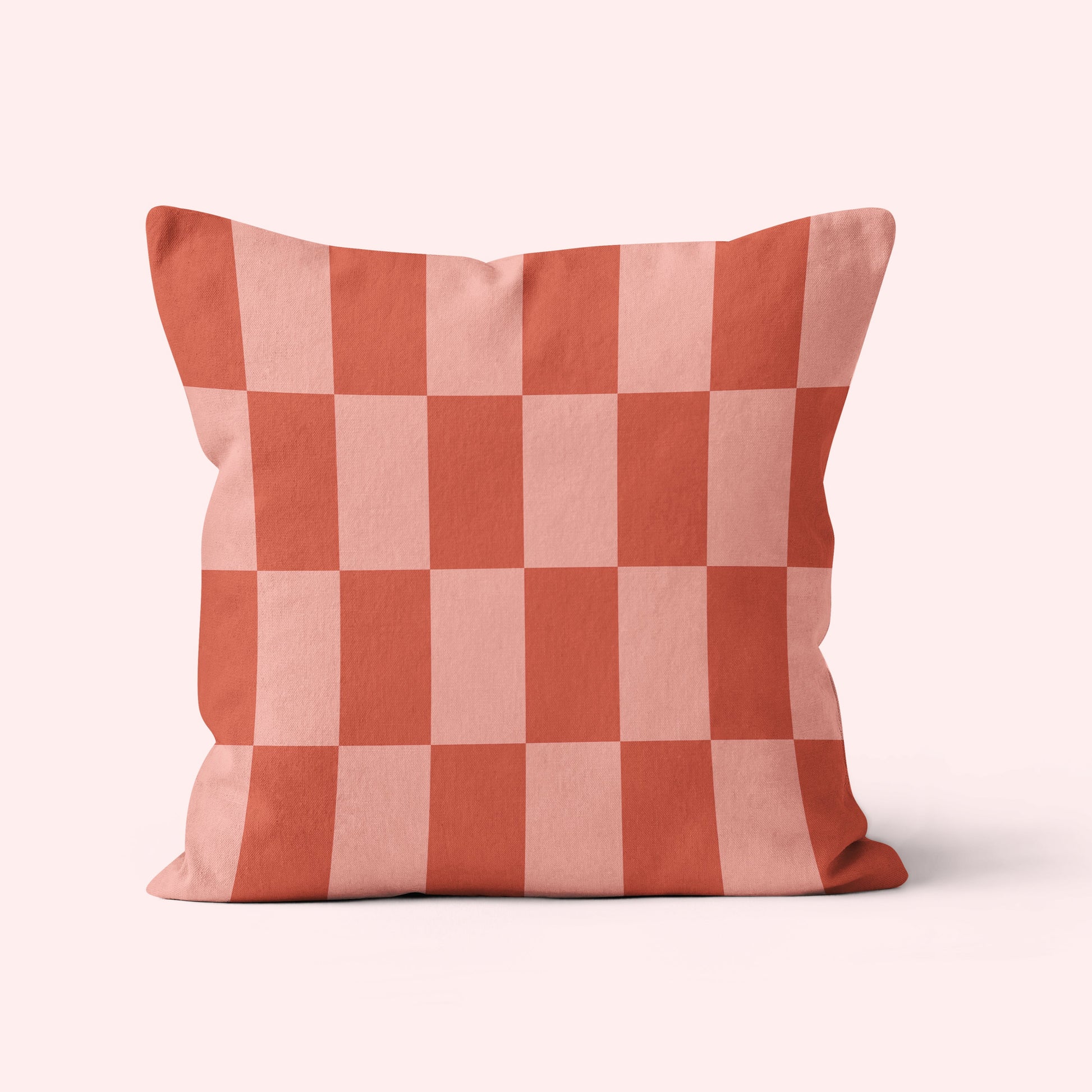 vintage inspired checkered cushion in rose brick colour retro home