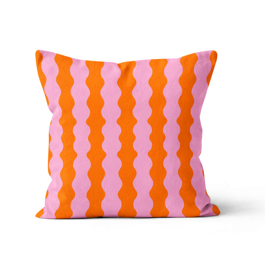 wavy velour cushion in bright orange and pink for a maximalist home decor square cushion