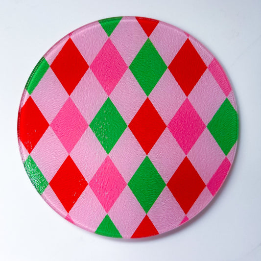 christmas trivet pot holder harlequin pattern, bright red, pink and green colours, christmas tableware