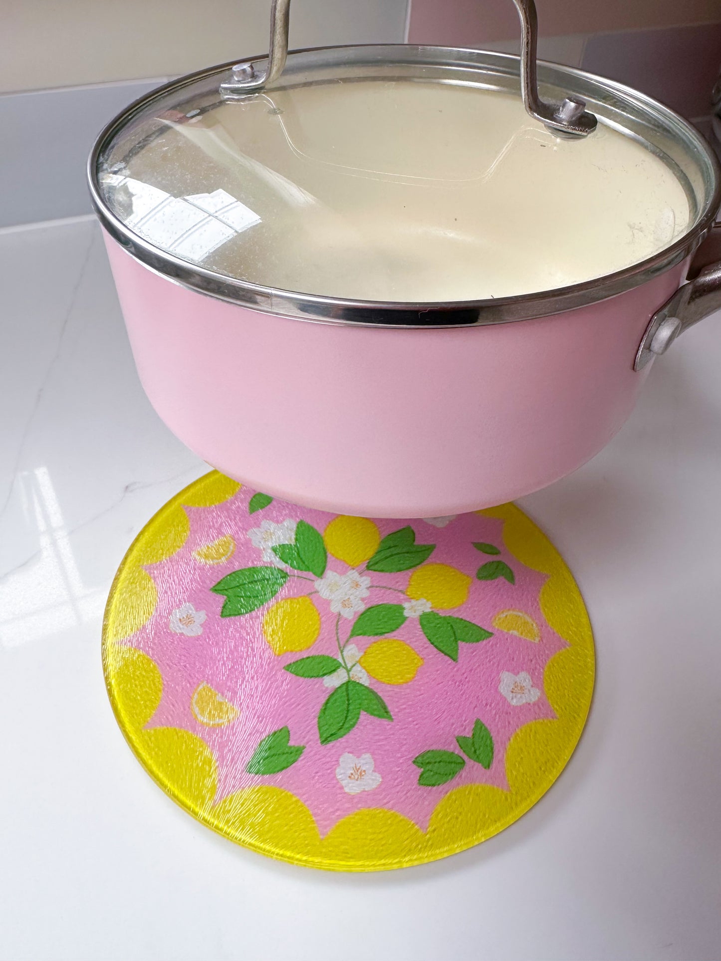 glass lemon trivet in pink and yellow colours, dopamine home decor, round placemat, glass pot dish, lemon homeware