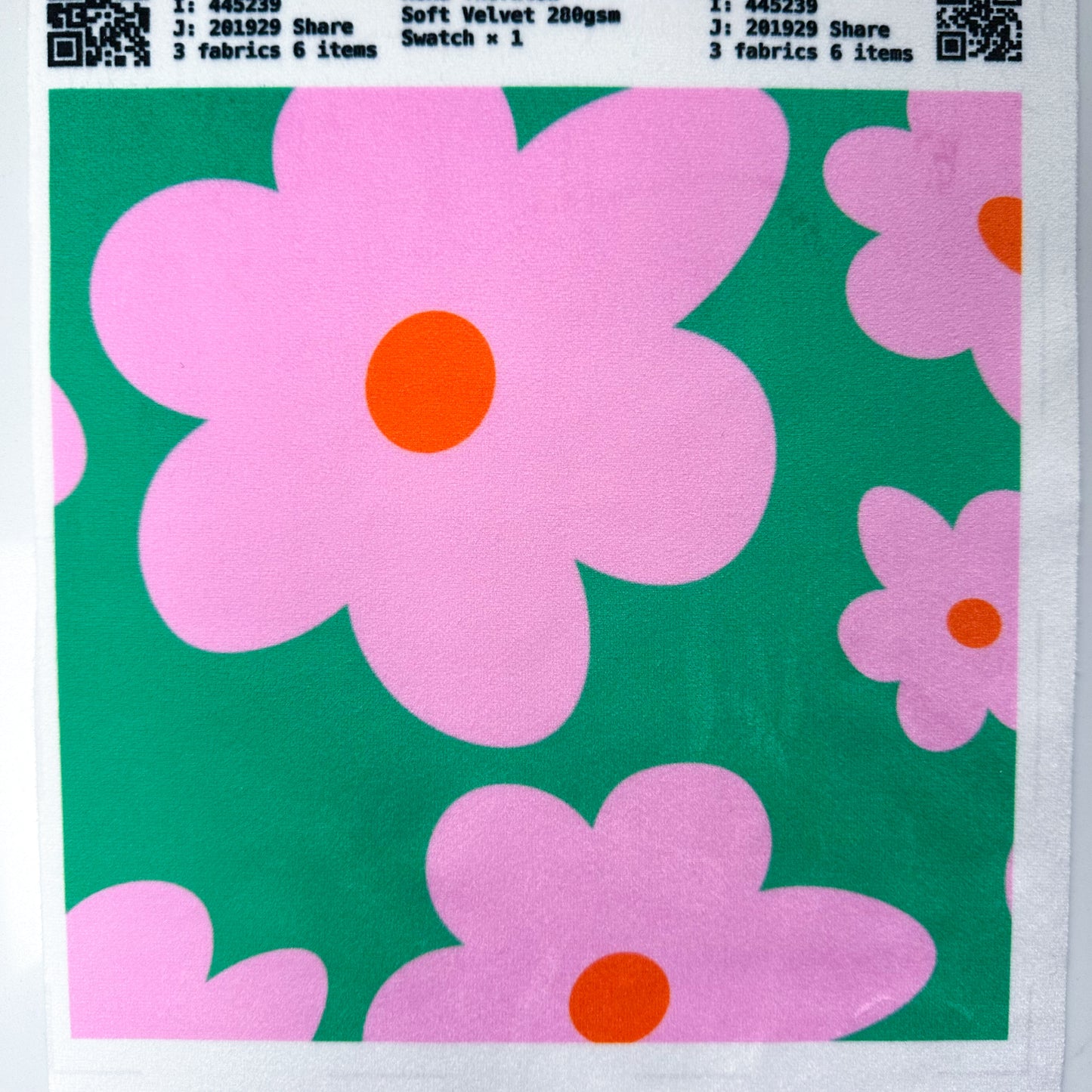 hello petal velvet fabric with pink flowers on green background perfect for upholstery sewing projects