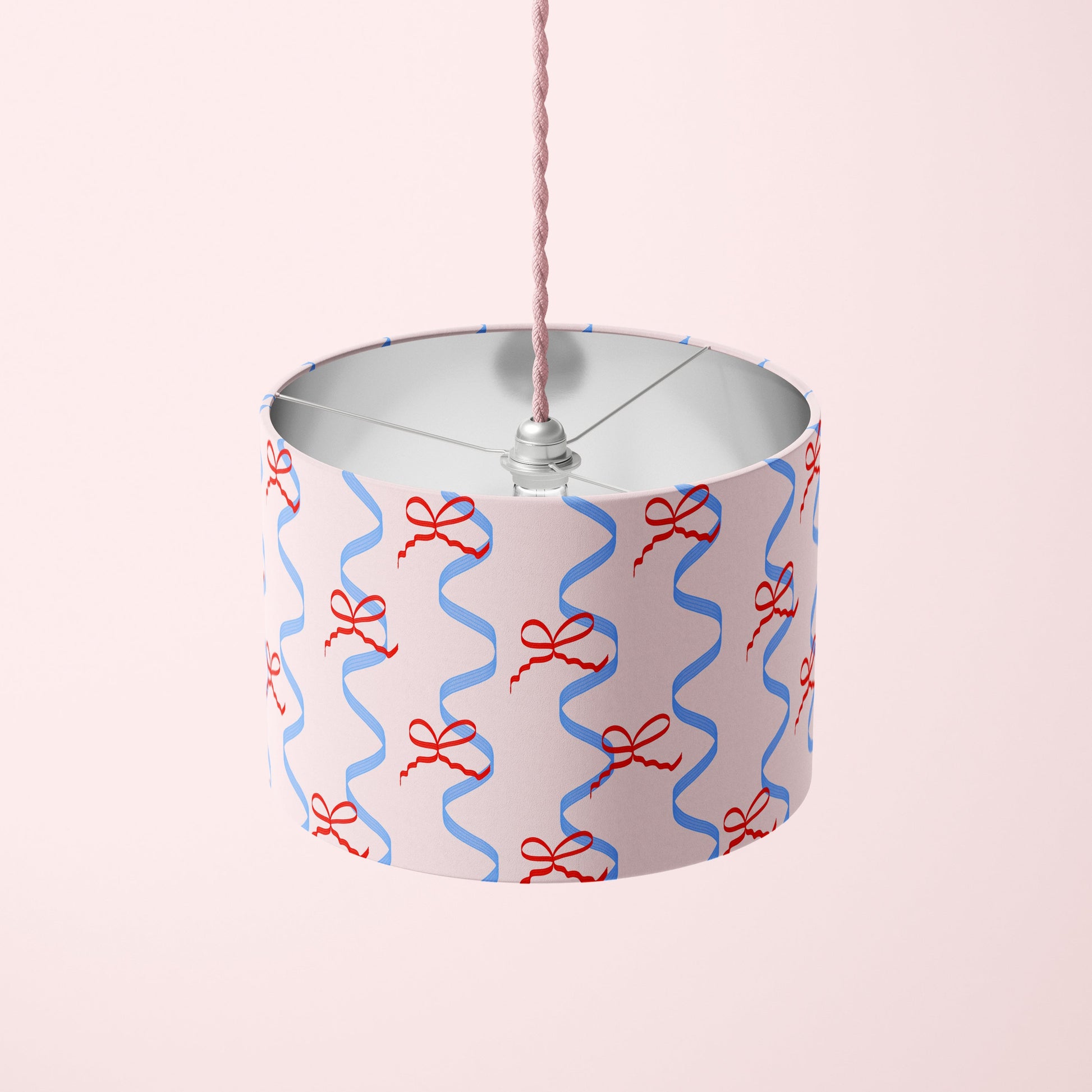 lampshade with bows and ribbons pattern in pink red and blue colours made from velvet material for girls room
