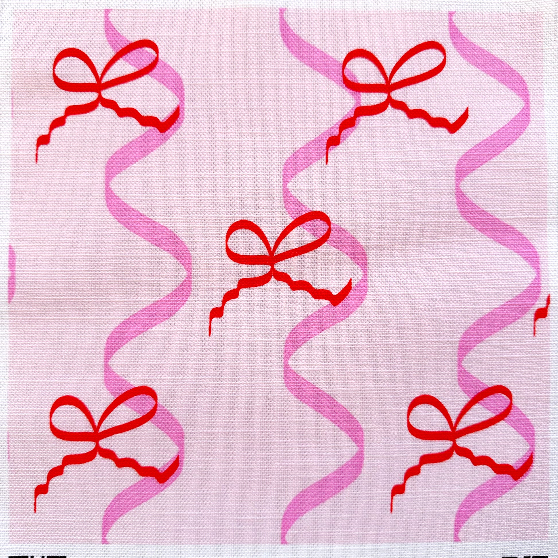 bows and ribbons patterned fabric for sewing upholstery in pink and red colours