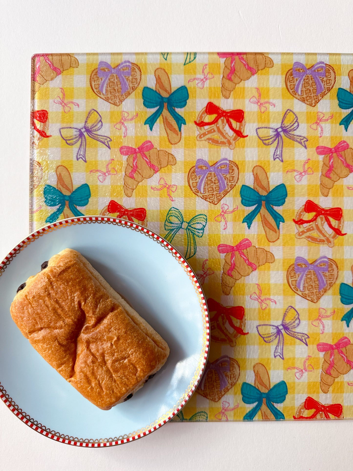 cutting board worktop saver with pastry croissant waffles pretzel design