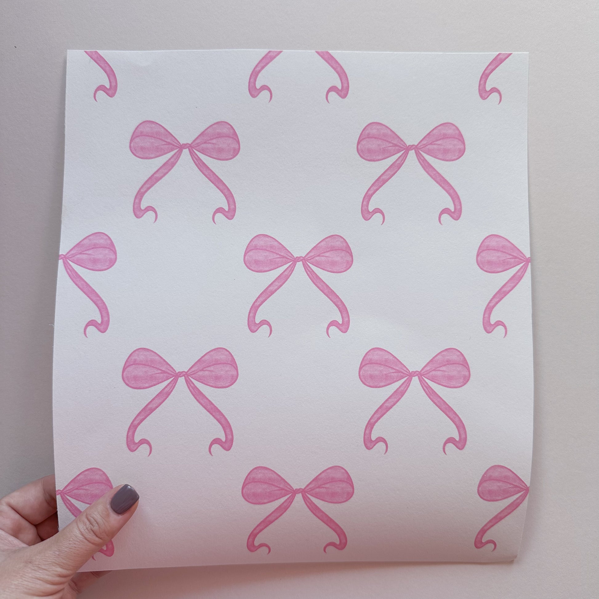 pink watercolour bows wallpaper for girls room nursery