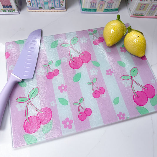 glass chopping board with cherries