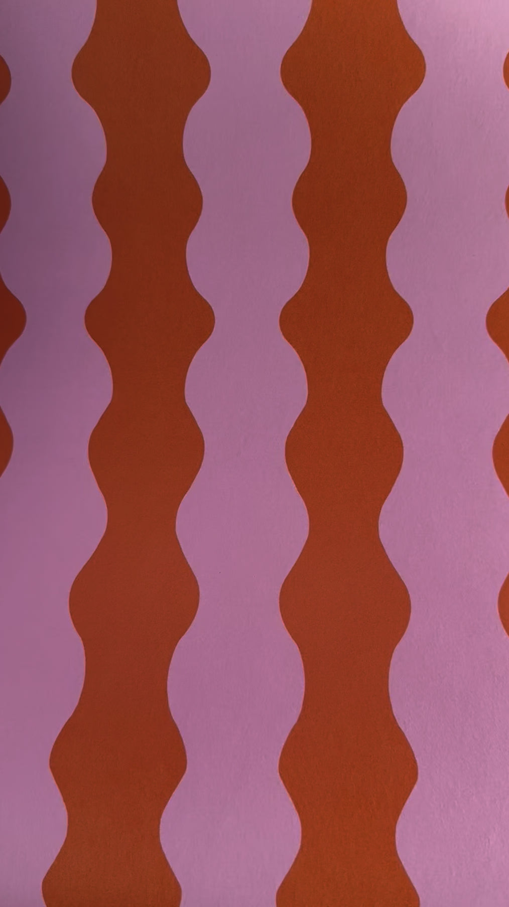 ‘Wiggle With Me' Wallpaper in Orange and Pink | orange wavy wallpaper