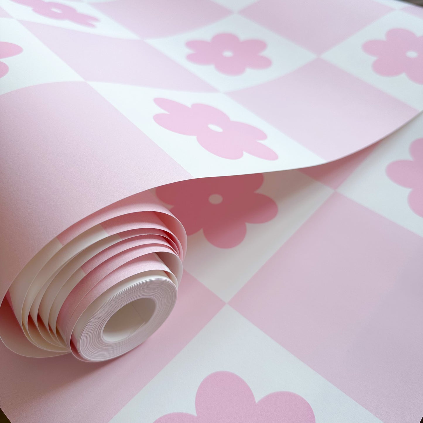 nursery wallpaper in pastel pink checkerboard daisy wallpaper UK girls bedroom